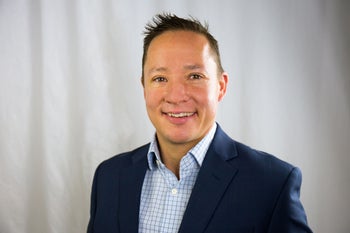 Portrait of Carter Lozinski, Realtor